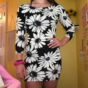 Tight black dress with white flowers